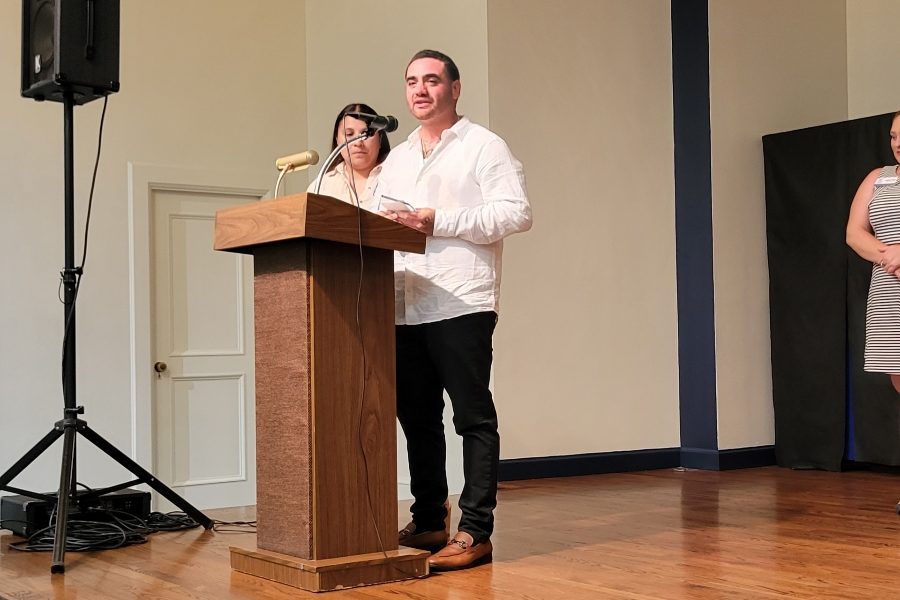 Bay Hauling owner Juan Vallejos speaking at the Chamber of Commerce Award ceremony