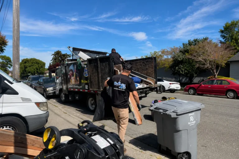 Bay Hauling junk removal vallejo crew loading unwanted furniture onto a truck